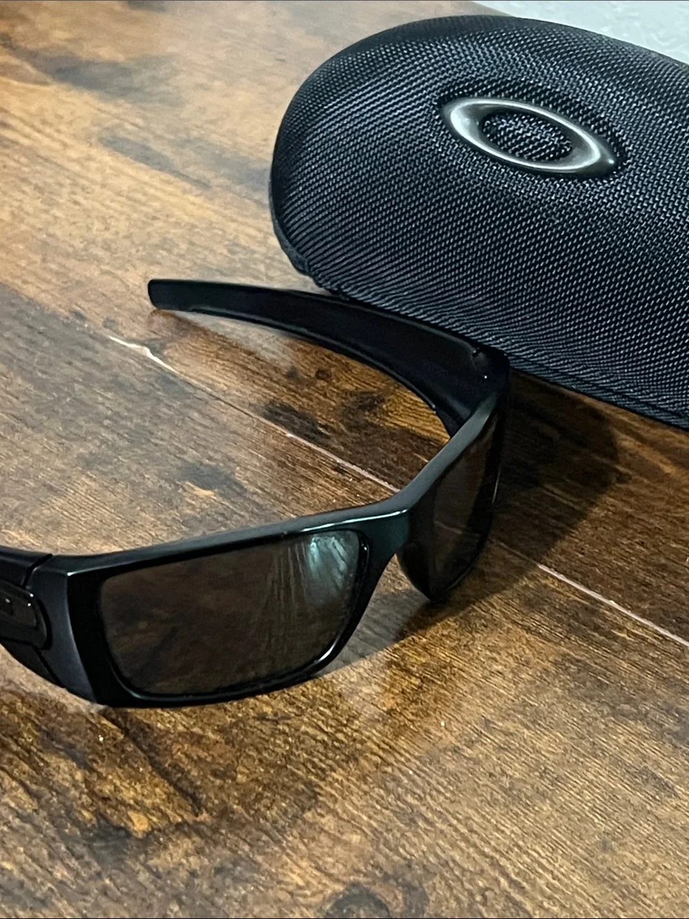 Oakley Black Sunglasses with Dark Lenses